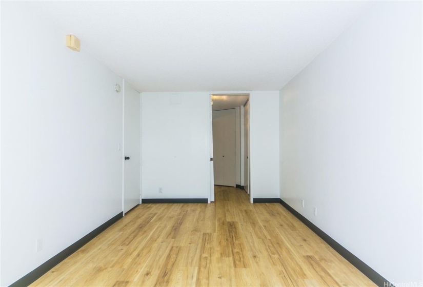 View of primary bedroom facing the primary bathroom from the second lanai