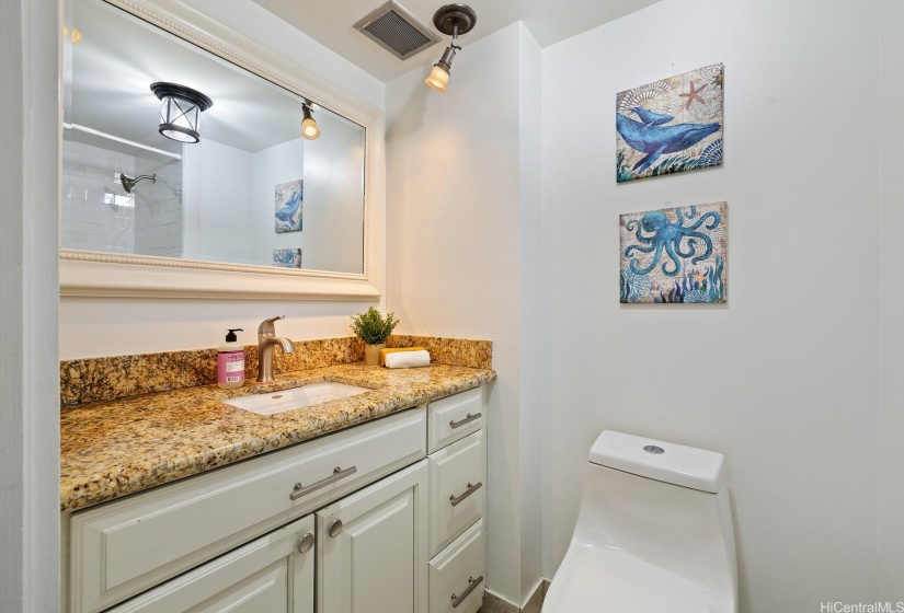 Full size guest bathroom with walk in shower