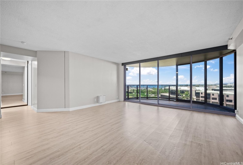 living room view - actual. Note the luxury vinyl plank flooring throughout.