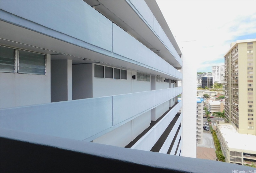 Single-load corridor allows the mauka trade winds to flow through the sliding bedroom windows.  #1806 is located near the end of the hallway for greater privacy.