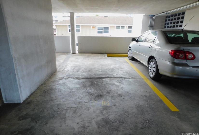 Covered assigned parking stall, steps away from the 2nd floor lobby.