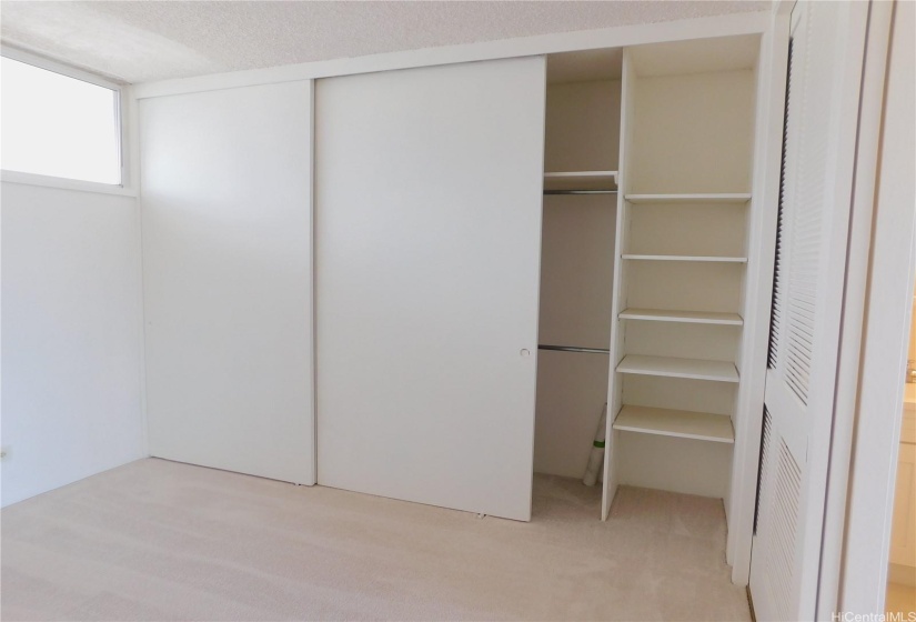 Full-wall of closet space with shelves