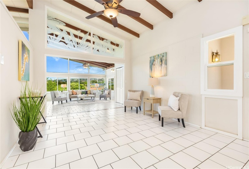 vaulted ceilings with gorgeous glass etched with birds of paradise
