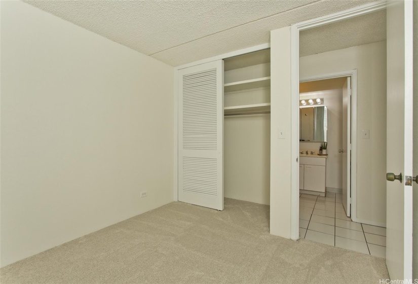 Unstaged side bedroom #2 across from main bathroom