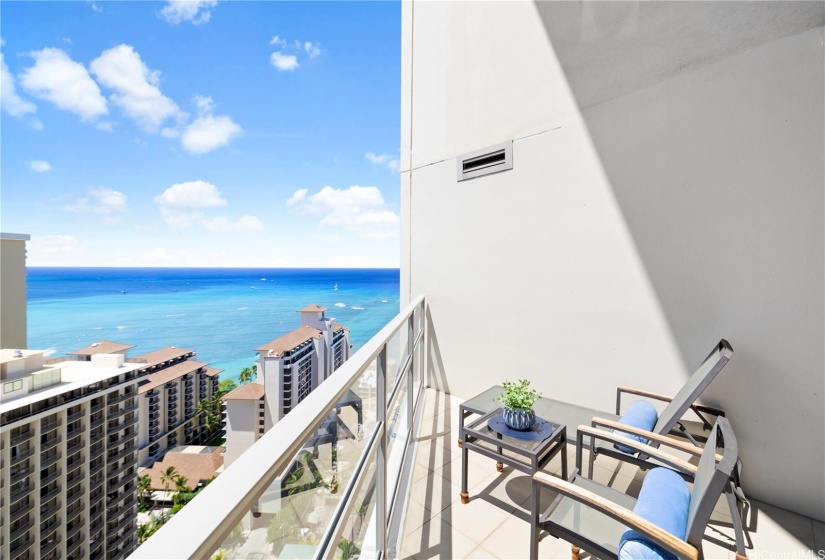 Primary Bedroom’s  lanai with views of Waikiki landmarks