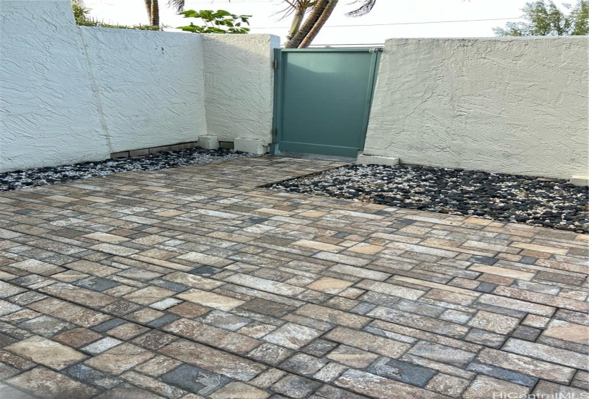 Outside enclosed and private tiled lanai.