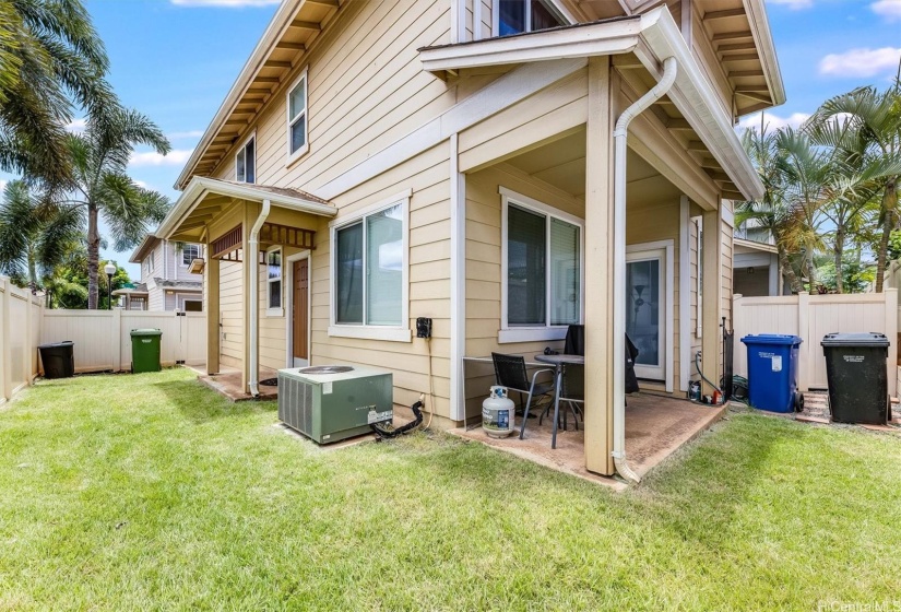 Fully enclosed backyard with no neighbor on one side.