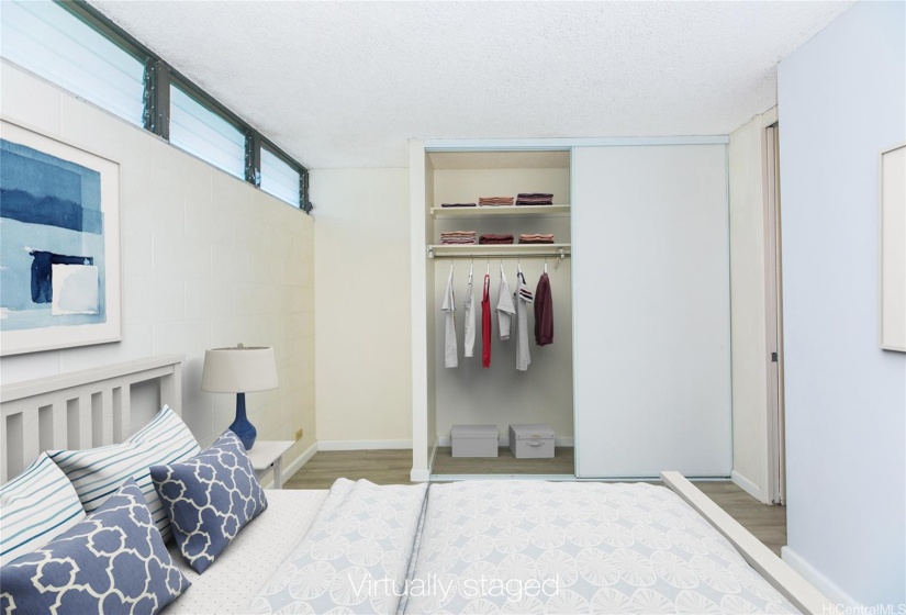 Generous bedroom with closet virtually staged