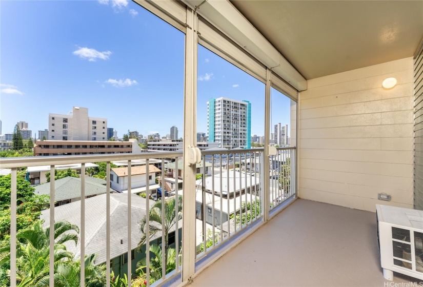 Open lanai with motorized shutters