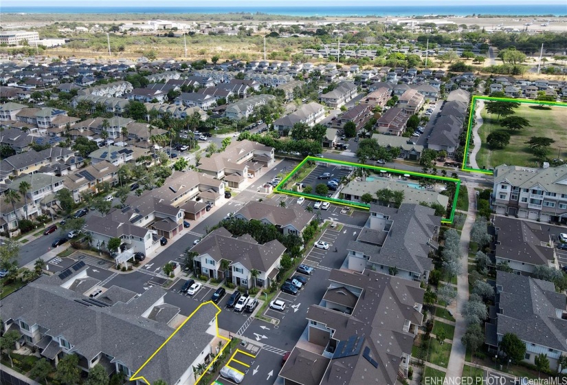 540 Manawai Unit 201: Enhanced arial view of townhouse & parking spaces outlined in yellow; Mehana Activity Center 