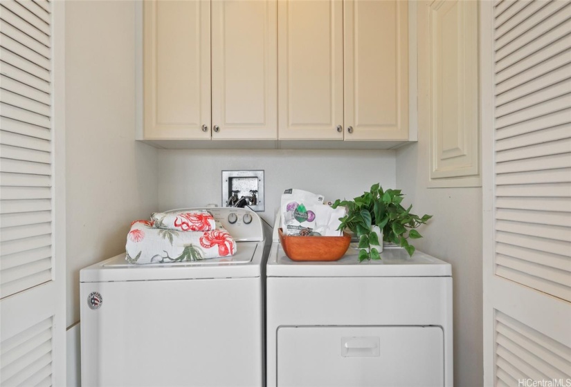 Laundry nestled near kitchen in Pantry