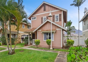 Holomoana landscaped front of house, two covered parking near home