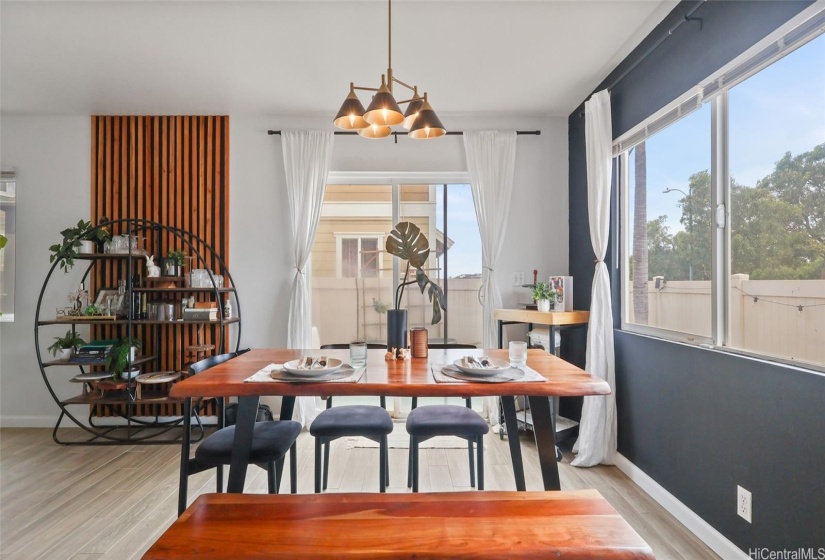 Spacious dining area opens up to yard