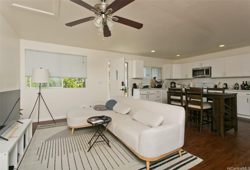 Living room and wet bar in back house