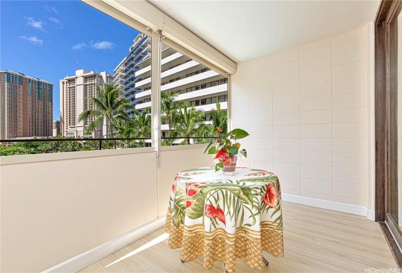 Enclosed lanai with sliding doors and Aluminum rolls down. Option to create a space for guests. You will love the versatility!