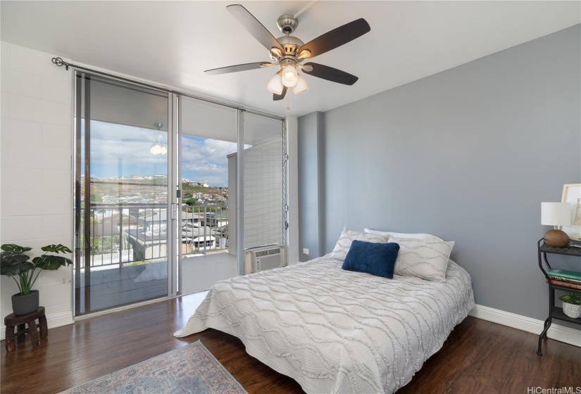 The bedroom is also open and airy.