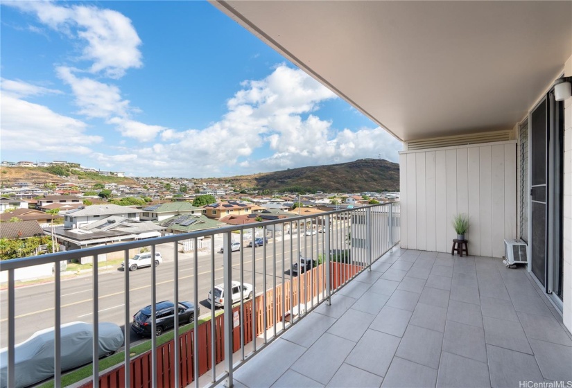 The lanai area has brings some pleasant residential and low-mountain views.