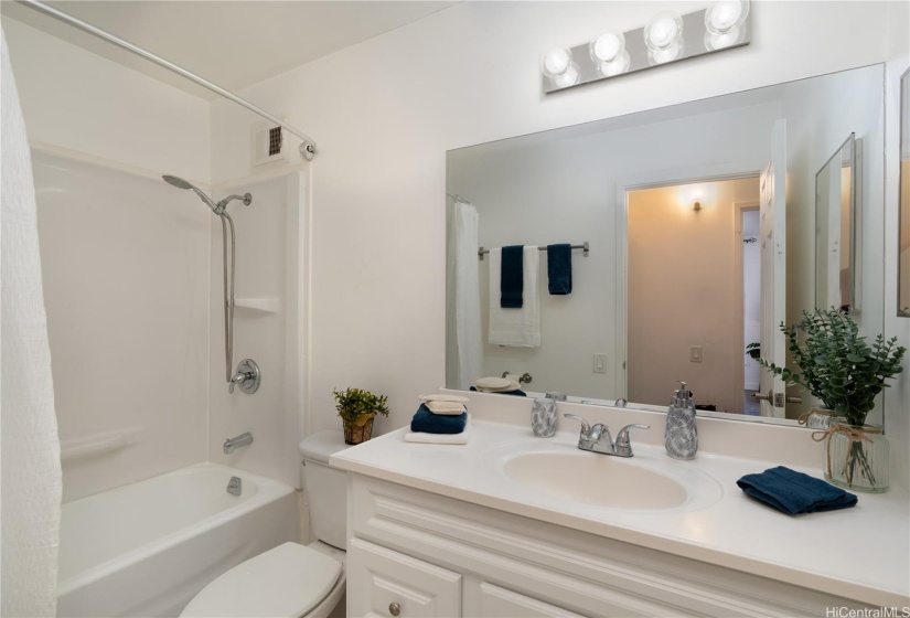 Renovated bathroom feels so open and clean!