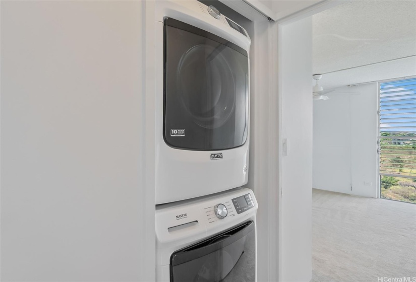 In-unit washer and dryer located between the two bedrooms