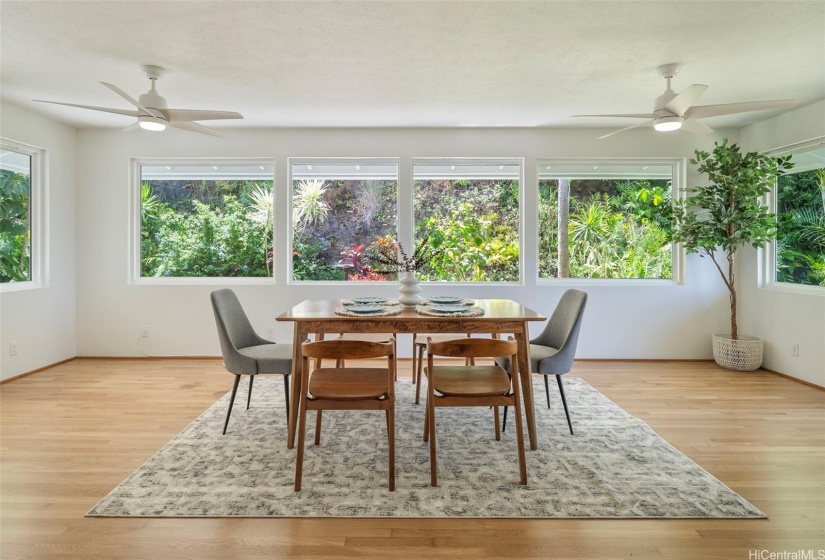 This might just be your favorite part of the home! The rear family room is nestled amongst tranquil nature. With a generous amount of space the possibilities are endless for how you will enjoy this room.