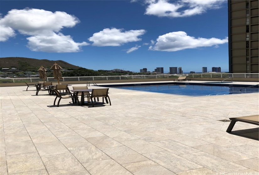 Large sun deck with large pool