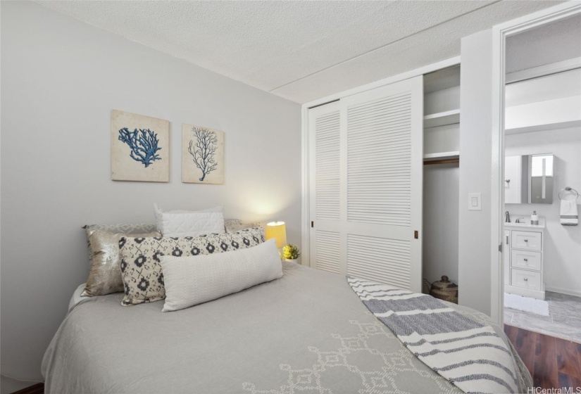 A nice-sized guest bedroom, adjacent to the guest bathroom and laundry..