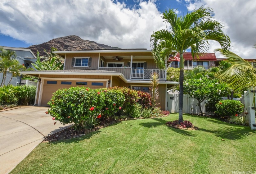 Front of the house with tropical landscaping