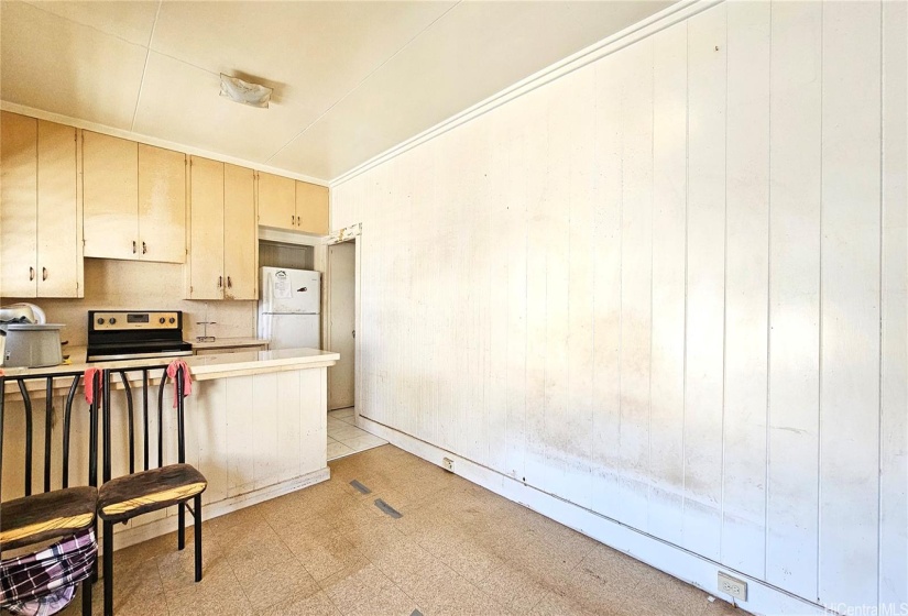 Vacant upstairs 1-bedroom living room and kitchen