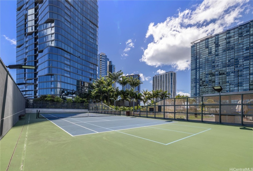 One of the rare buildings with a full-size tennis court!