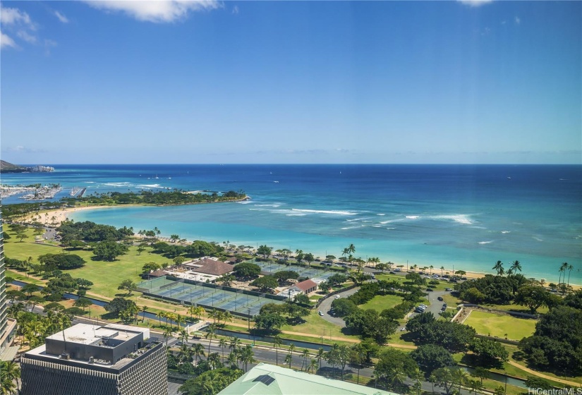 Breathtaking Ala Moana Beach view from living room sofa