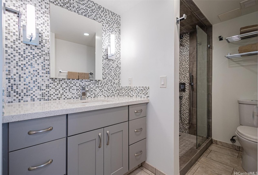 Gorgeous backsplash and luxury vanity