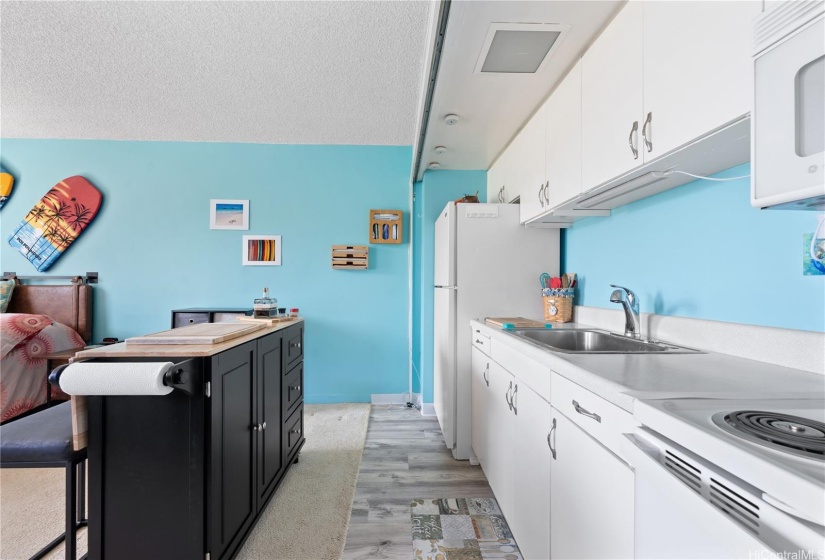 Clean kitchen with white cabinetry