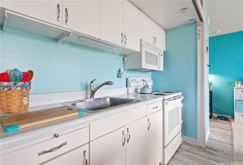 Clean kitchen with white cabinetry