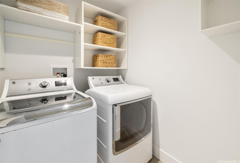 Laundry room is situated on the lower level