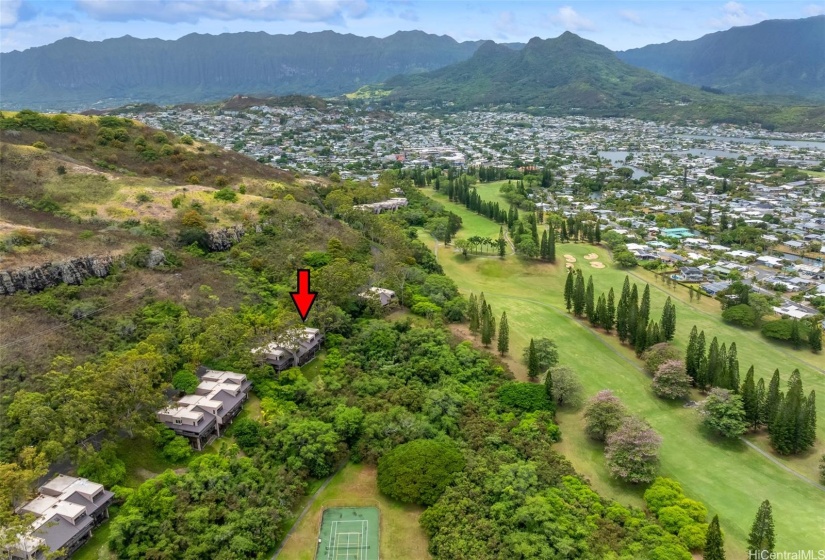 Watch the sun set over the mountains from this corner unit surrounded by trees