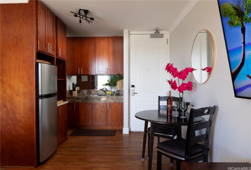 Entry, meal prep and dining area