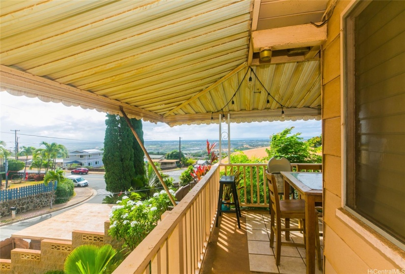 Another view of the covered lanai and the view beyond