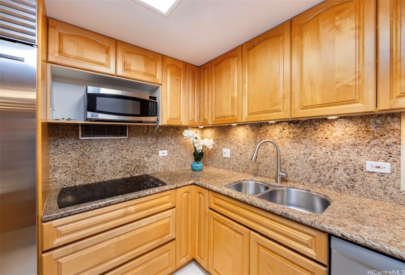 Well equipped kitchen provides inviting ambience for cooking & gatherings.