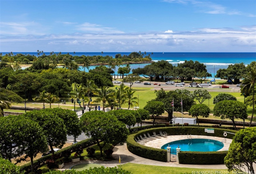 Swimming pool overlooking the beach park. Enhanced. Zoomed-in photo.