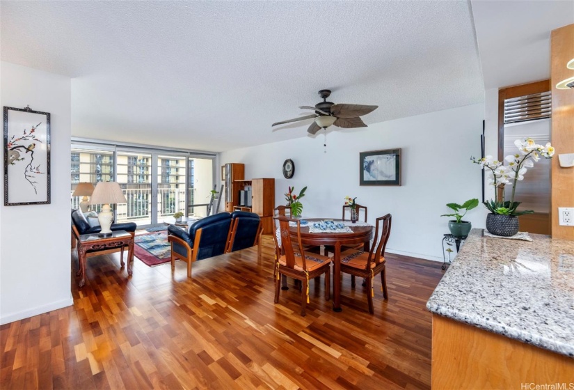 Open-concept primary living space joining a  dining areas and gourmet kitchen.