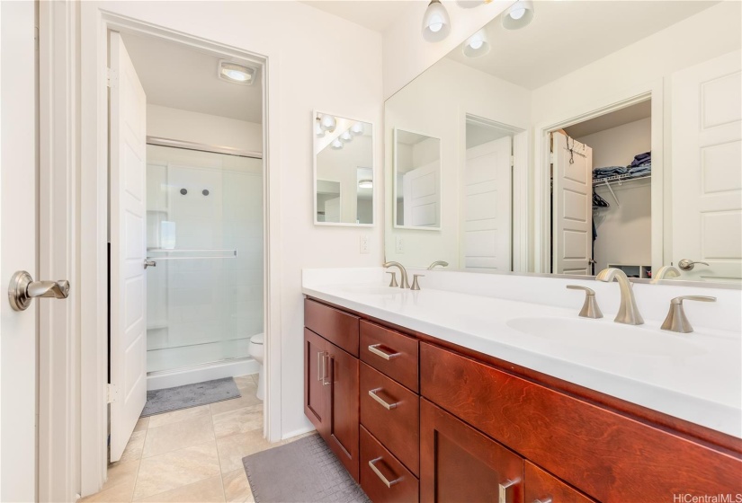 Primary bathroom with dual vanity sinks