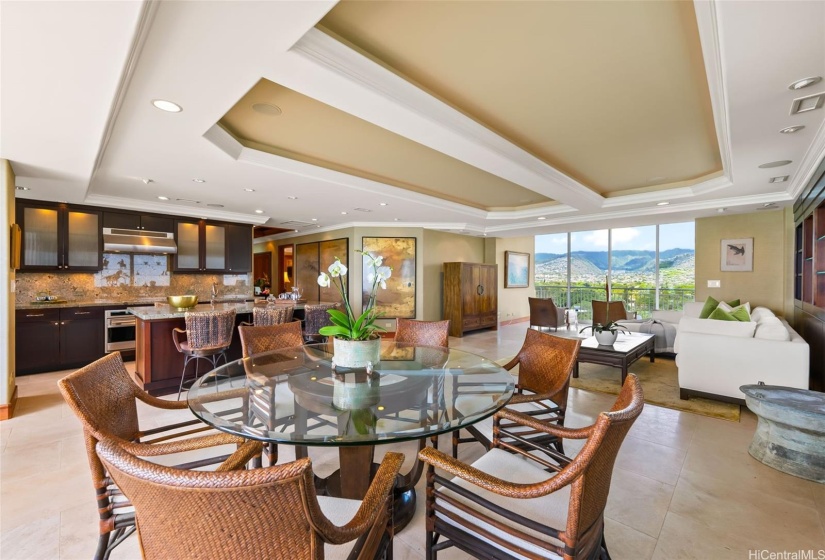 Another view of the dining, kitchen and living area