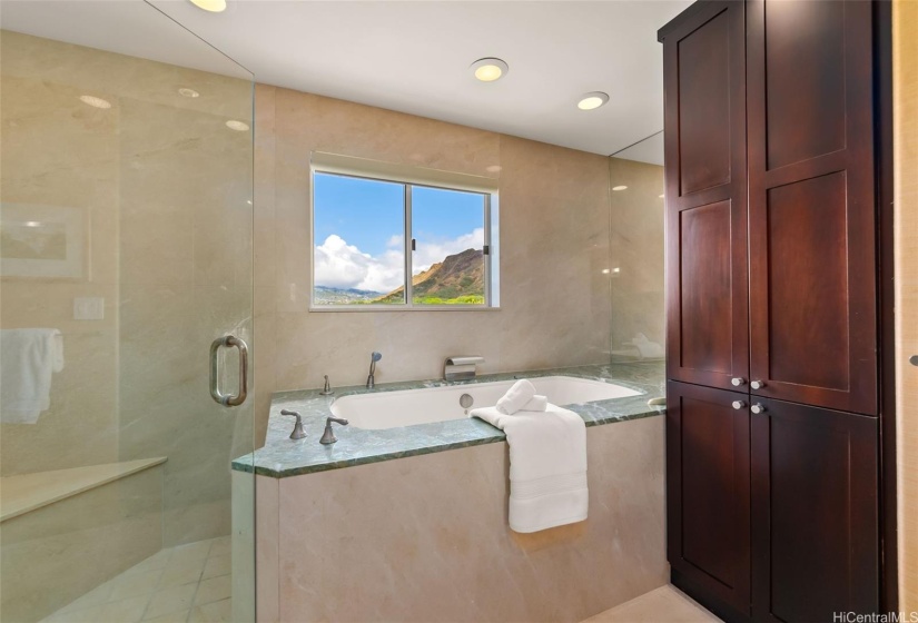 Jetted tub and walk-in shower. Yes, that is a view of Diamond Head :)