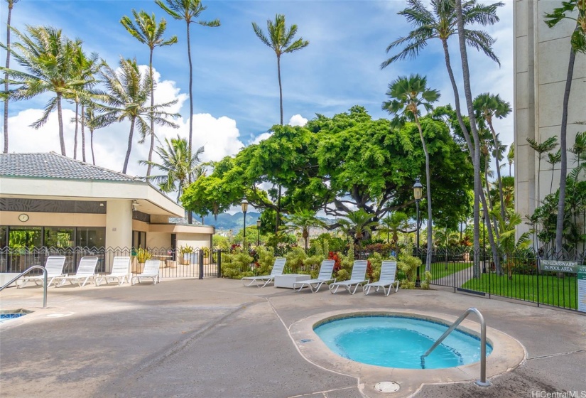 The pool area also has a separate hot tub to enjoy