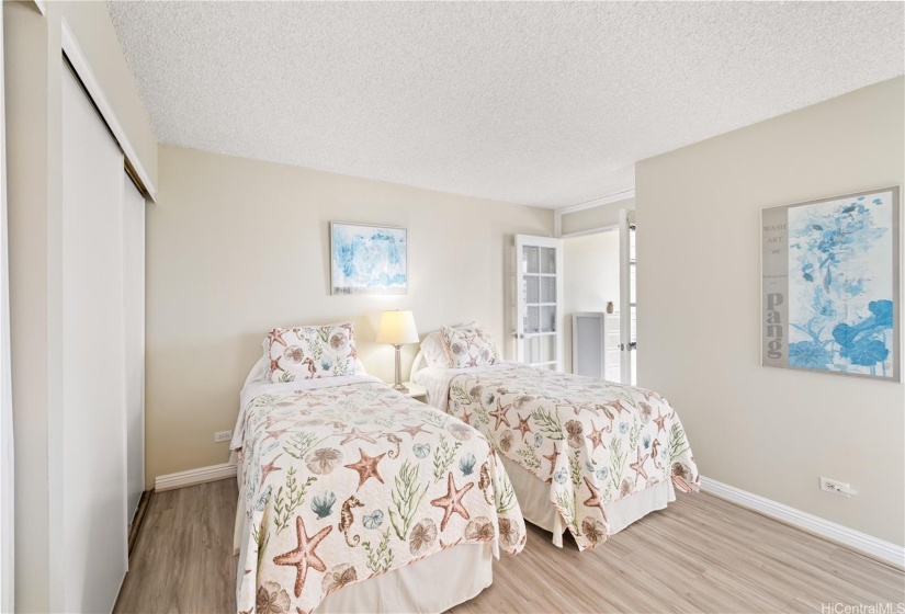 The spacious bedroom allows for two twin beds.