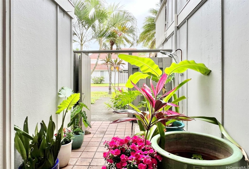 Gated front lanai with cool shower