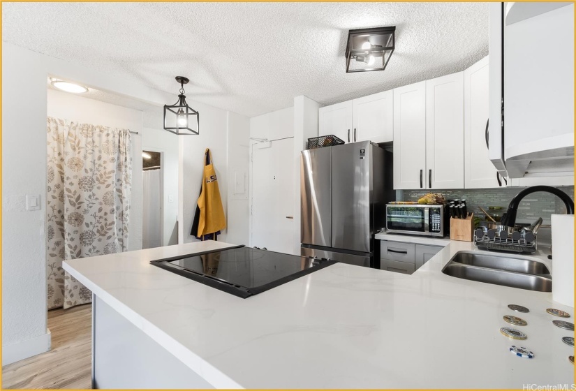 Open Kitchen and a glance into the hallway