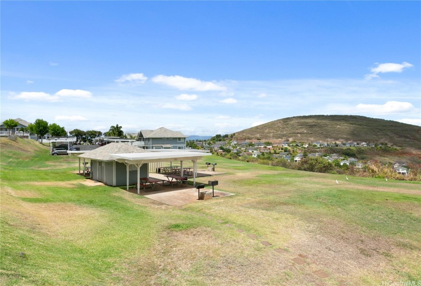 Makakilo Cliffs common area with picnic tables and BBQs.