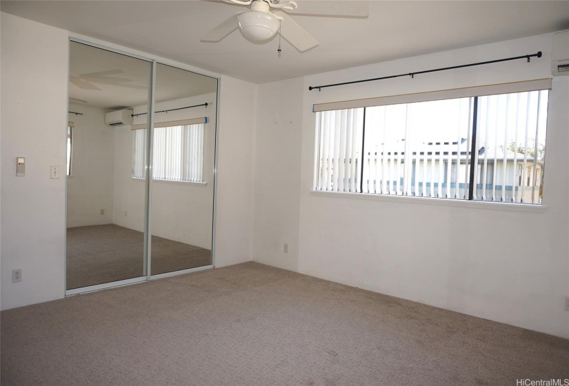 Walk in closet in primary bedroom