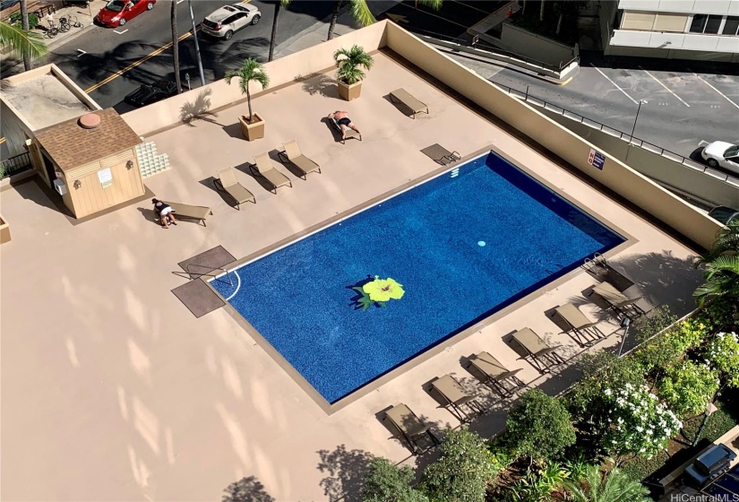 View of pool and recreation deck from unit lanai